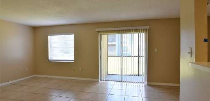 UPDATED KITCHEN!!! 2BR 1BA in Windmill Point. Waterford Lakes/UCF area. ALL TILE FLOORS, Community Pool!